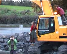 Digger diving at protests against the roadbuilding at the Hill Of Tara, Ireland